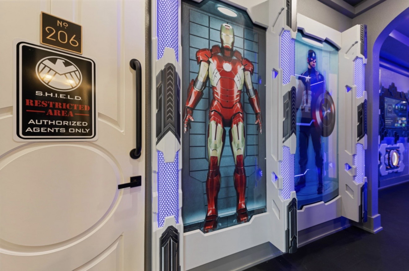 Marvel-themed room entrance with Iron Man and Captain America displays